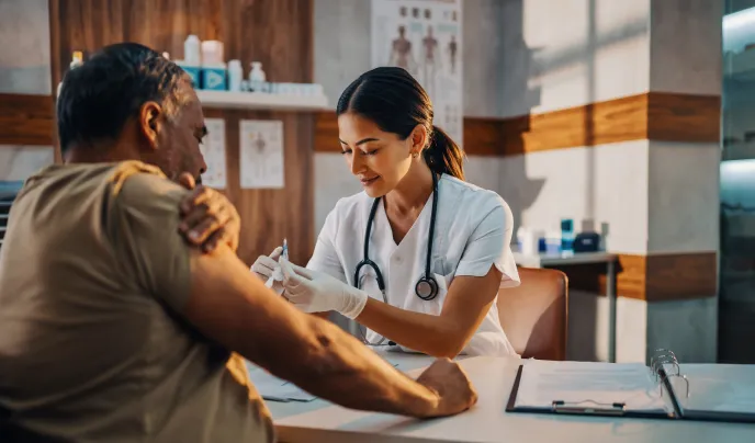 Physician interacting with patient
